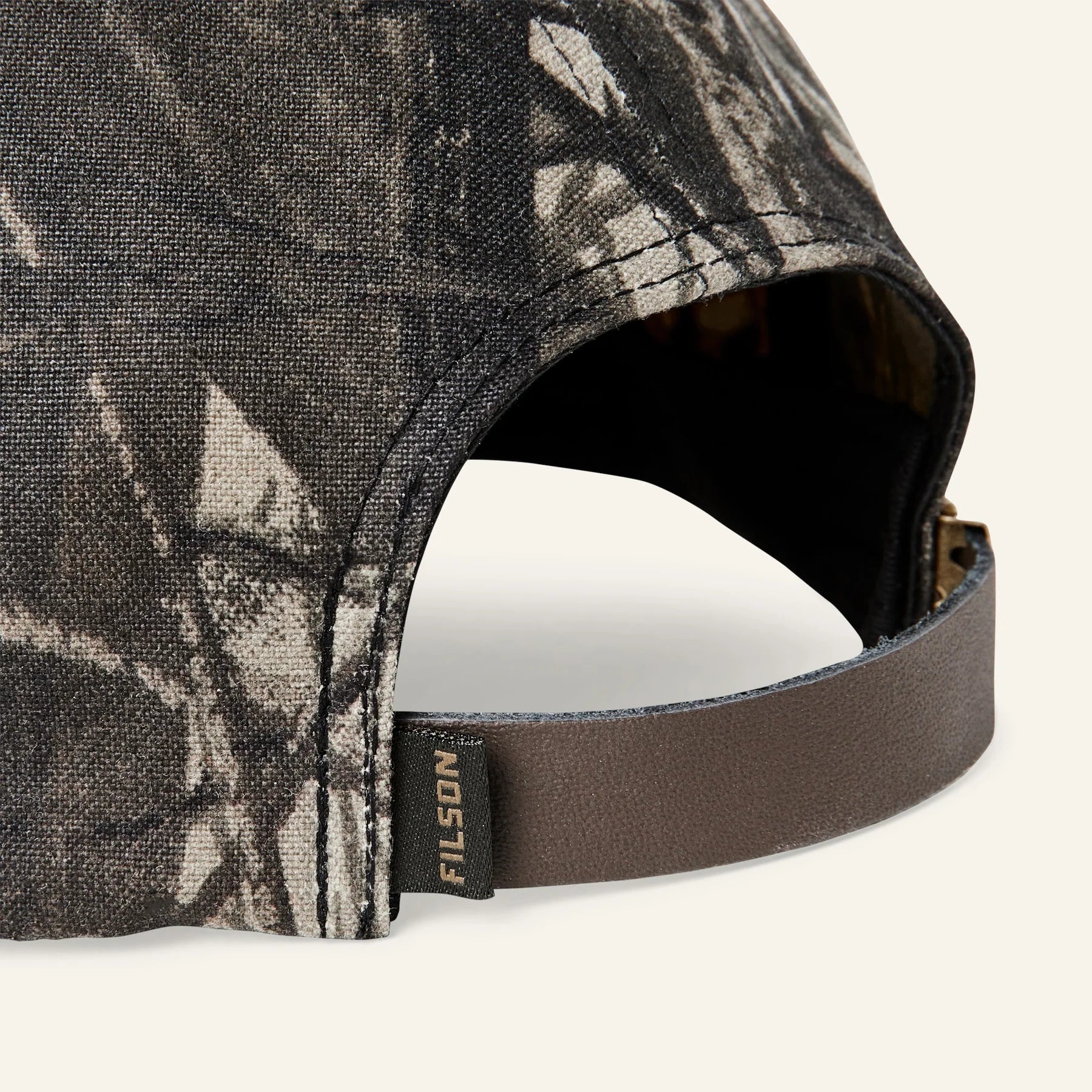 FILSON - OIL TIN LOW PROFILE LOGGER CAP - REALTREE HARDWOODS CAMO